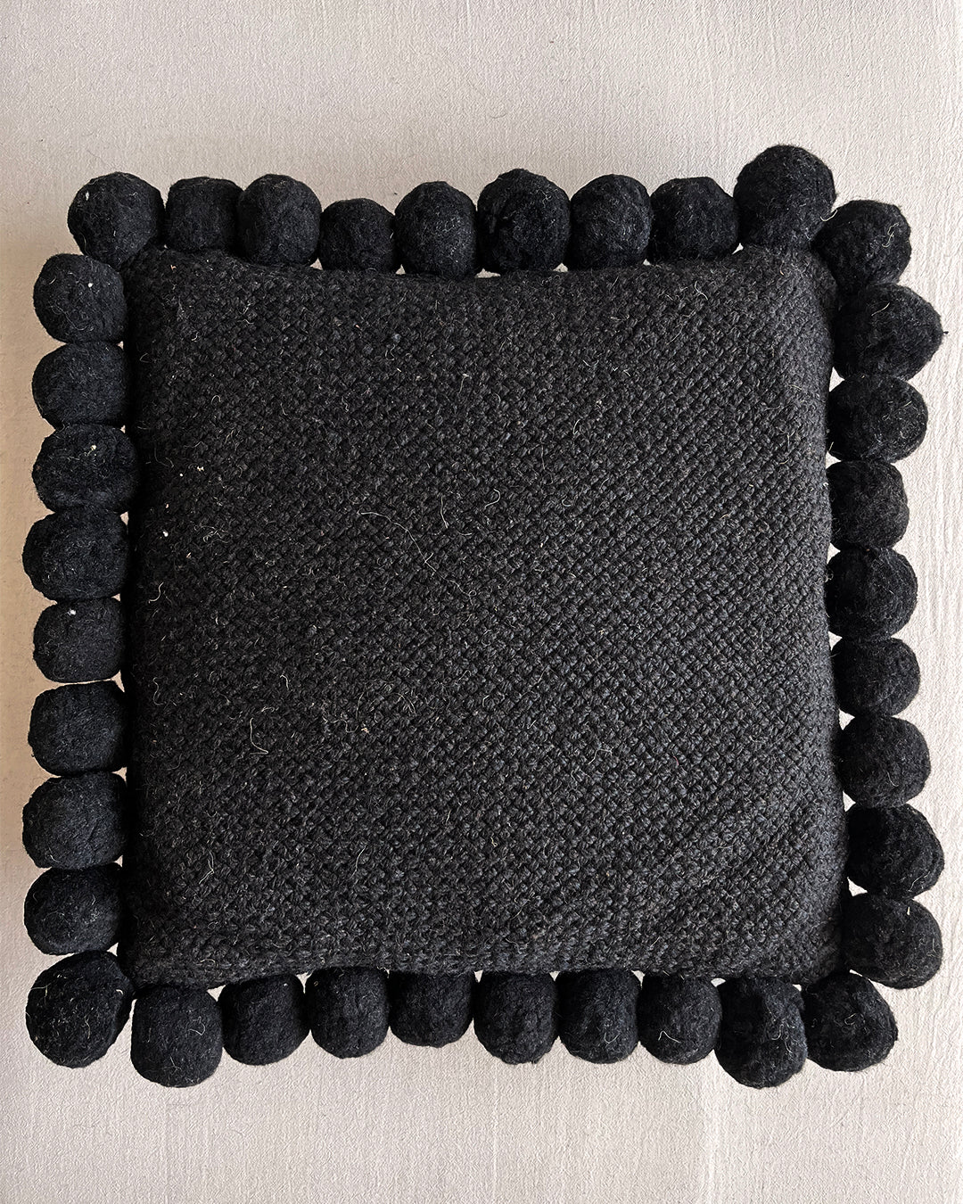 Square Pom Pom Cushion – Black (L)